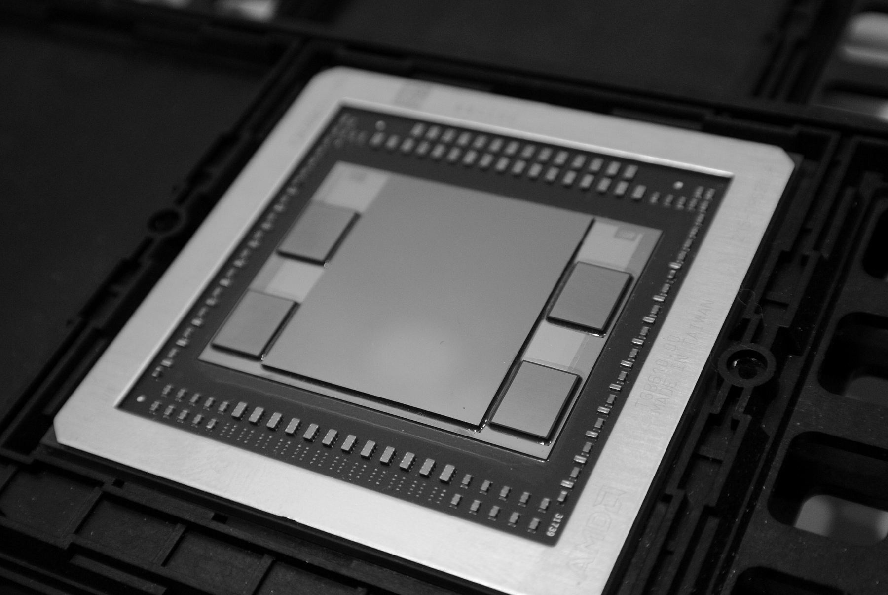 A graphics processor chip with its memory, the kind of hardware AI models run on