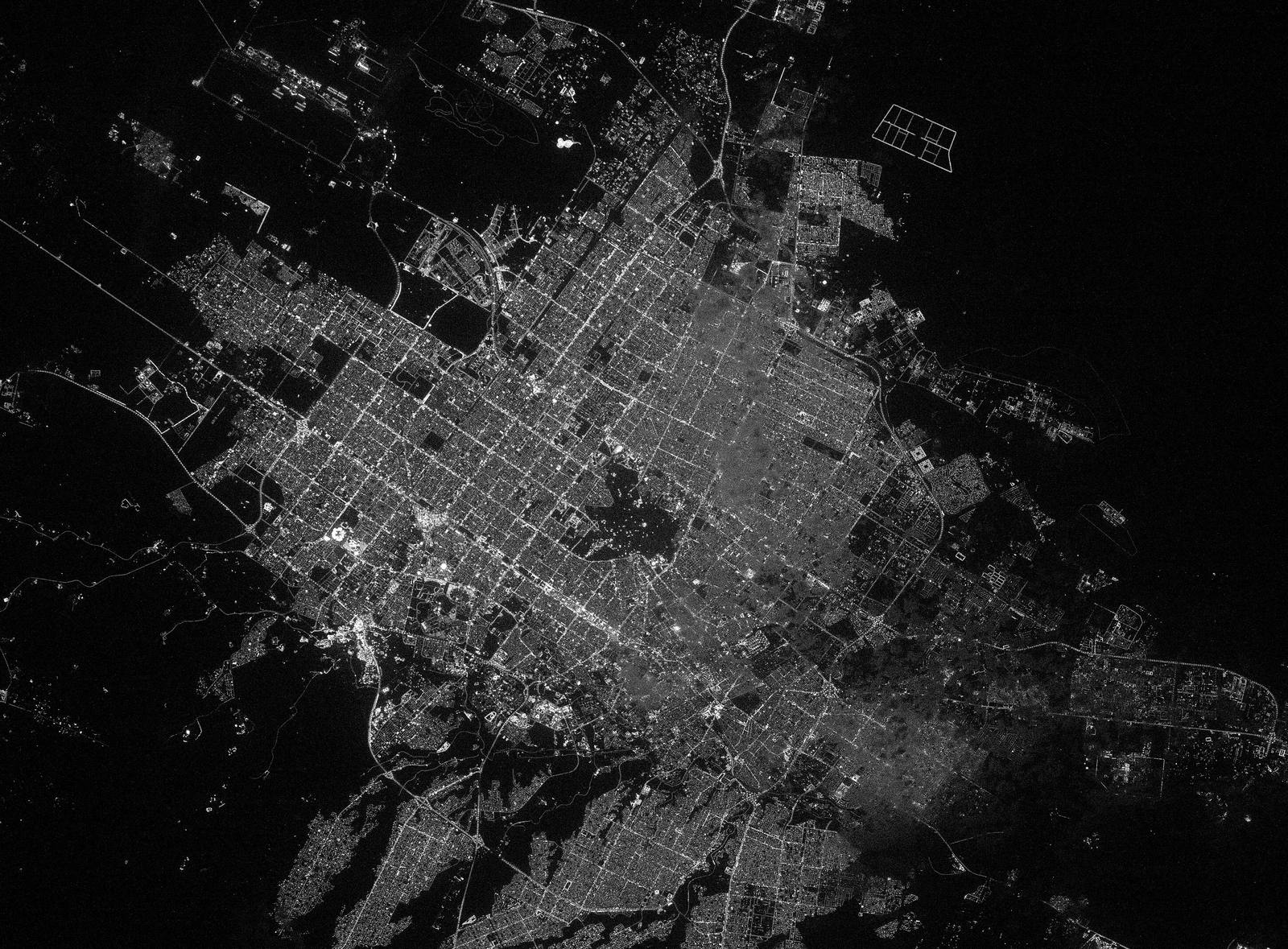 Riyadh at night seen from the International Space Station: its lit grid of streets spreading into the desert